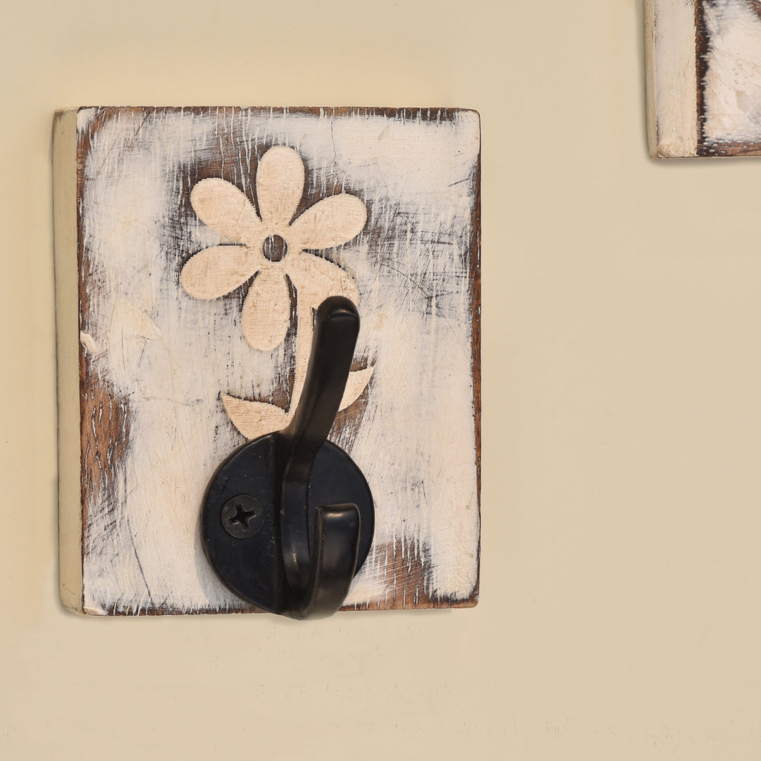 STYLISH CAST IRON BLACK WALL HOOK WITH WHITE FLORAL PATTERN ON ENGRAVED WOOD